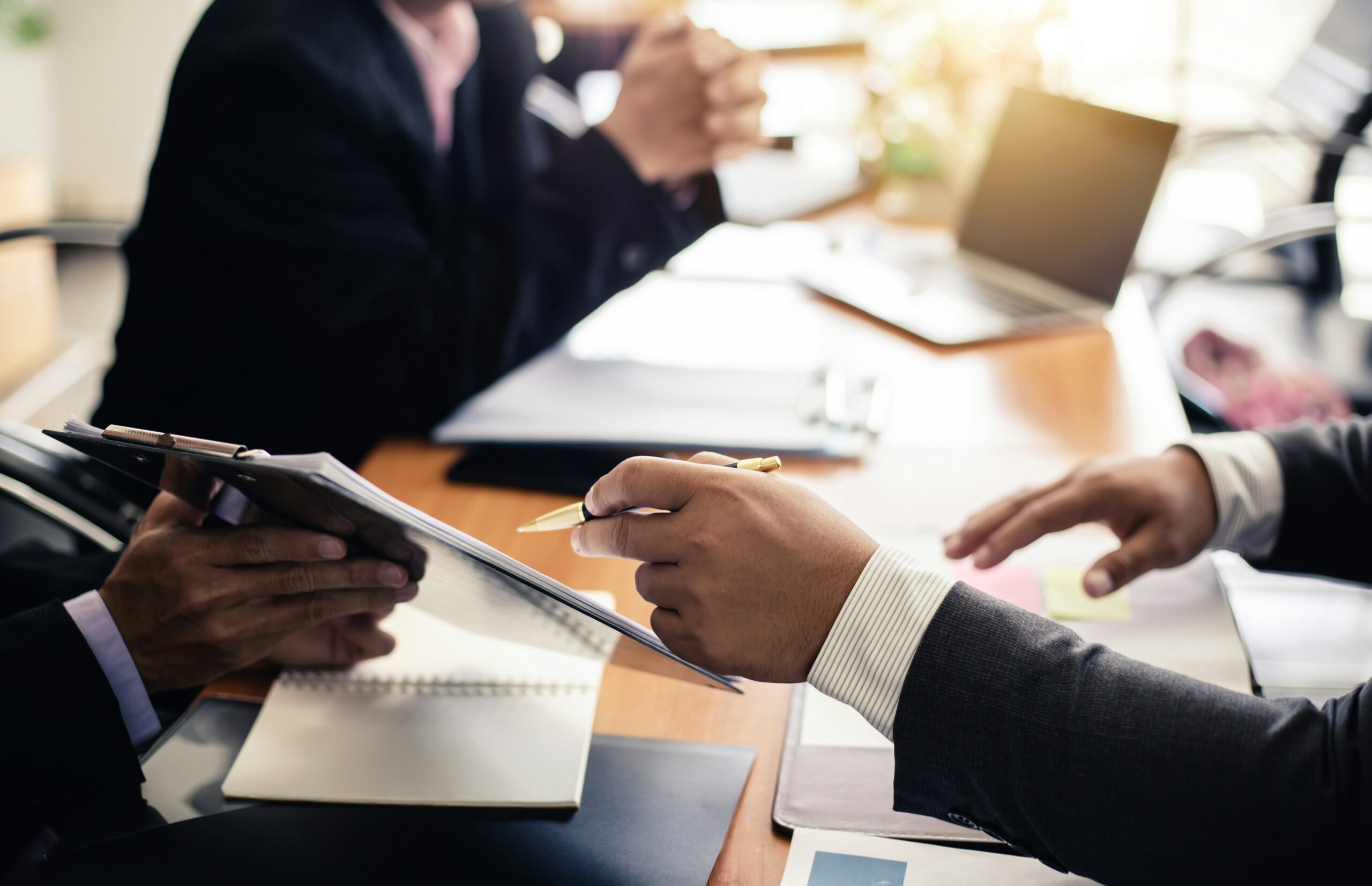 WCSS attorney meeting with Arkansas business owner and financial advisor