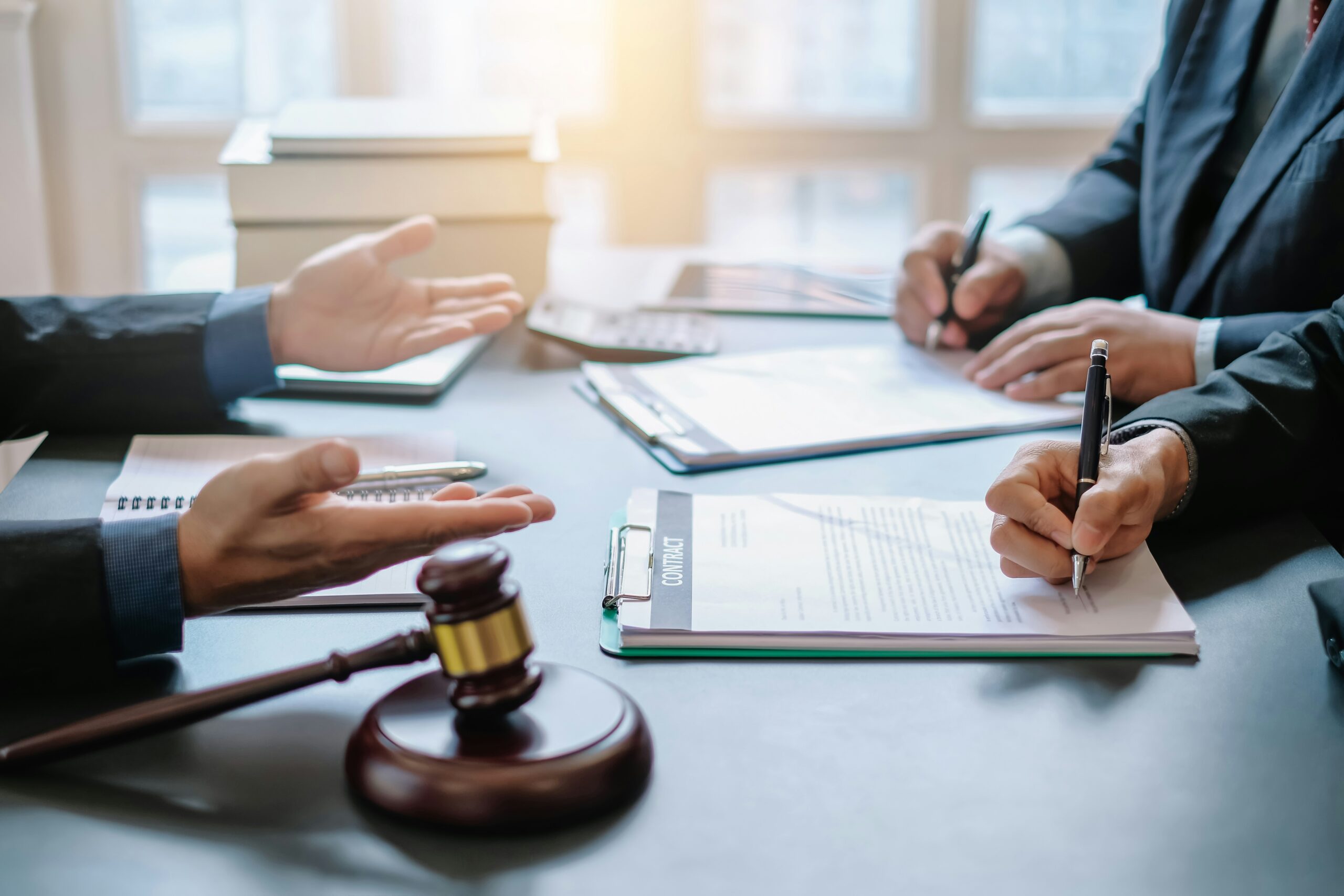 Arkansas estate planning attorney reviewing 2026 law changes with client.